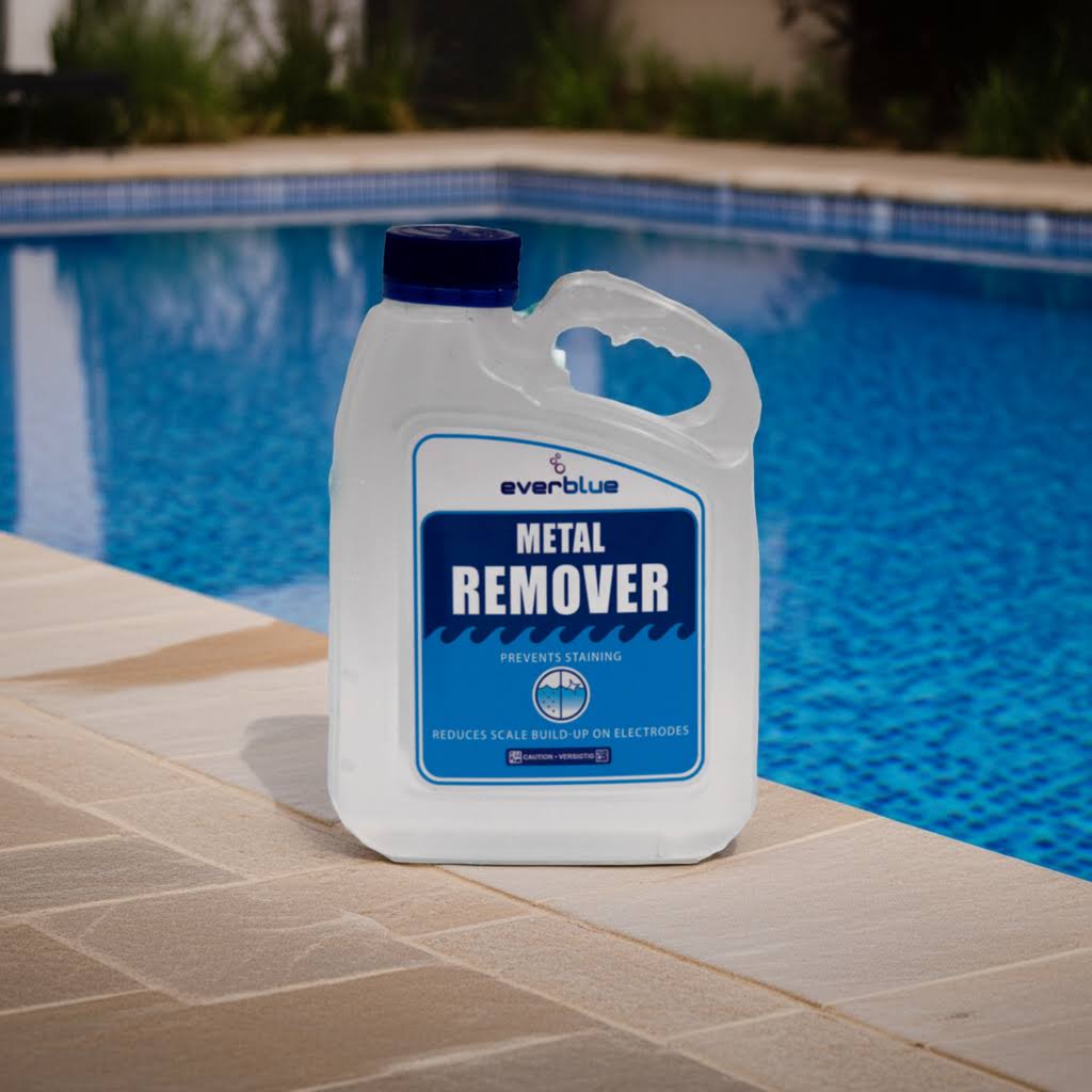 Container of metal remover by EverBlue on a pool deck with a pool in the background