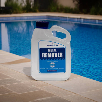 Container of metal remover by EverBlue on a pool deck with a pool in the background