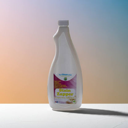 Bottle of Stain Zapper on a gradient background